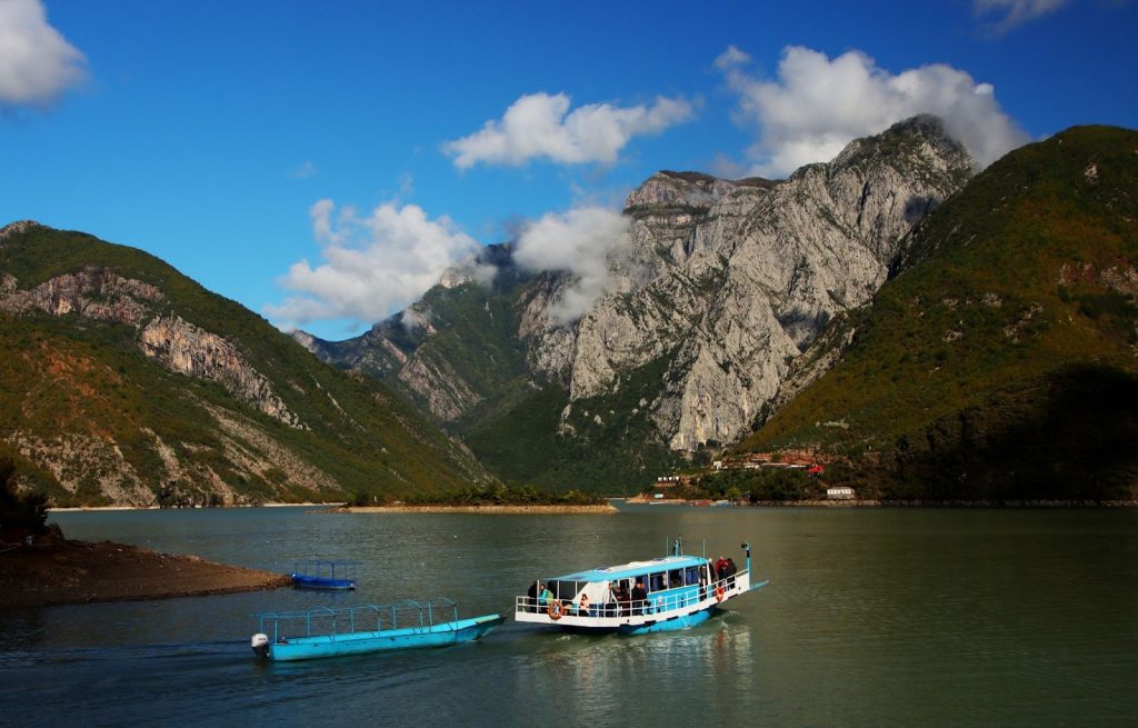 Komani Lake ferry passing through steep canyons on the Valbona Pass from Theth route